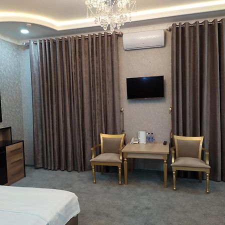 Diyor Hotel Marghilon Esterno foto