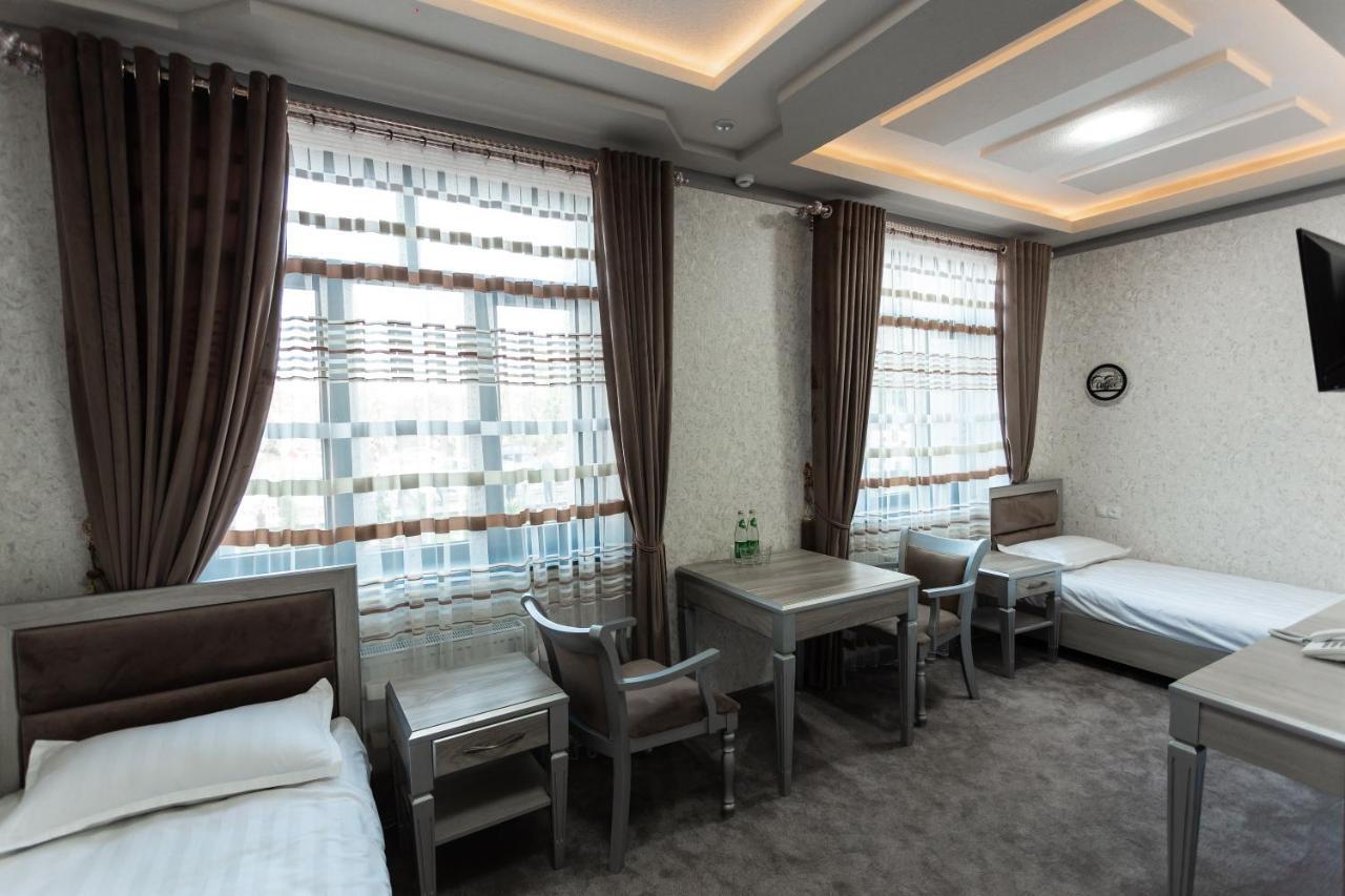 Diyor Hotel Marghilon Esterno foto
