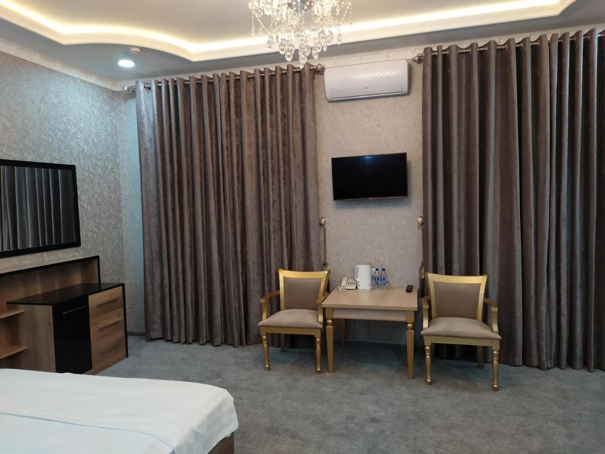 Diyor Hotel Marghilon Esterno foto