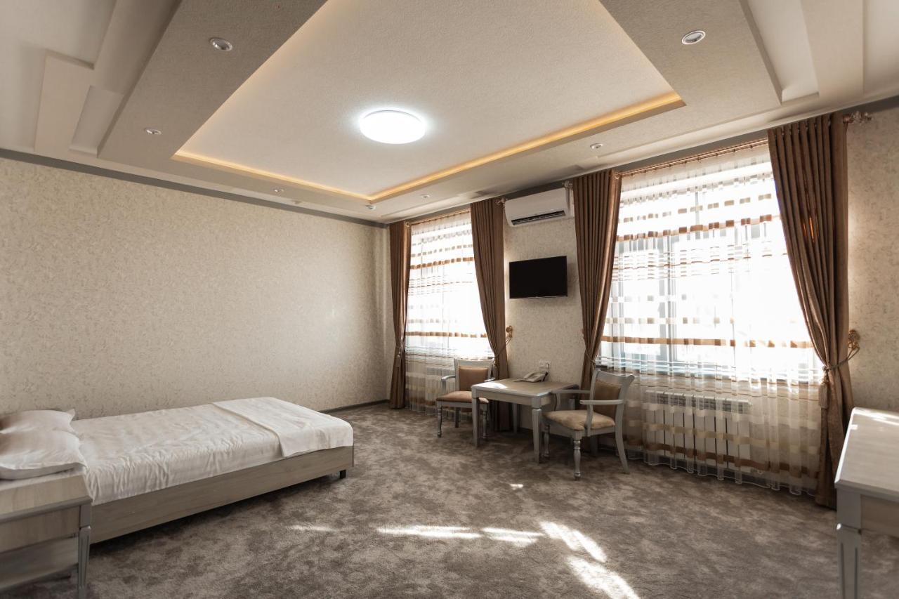 Diyor Hotel Marghilon Esterno foto