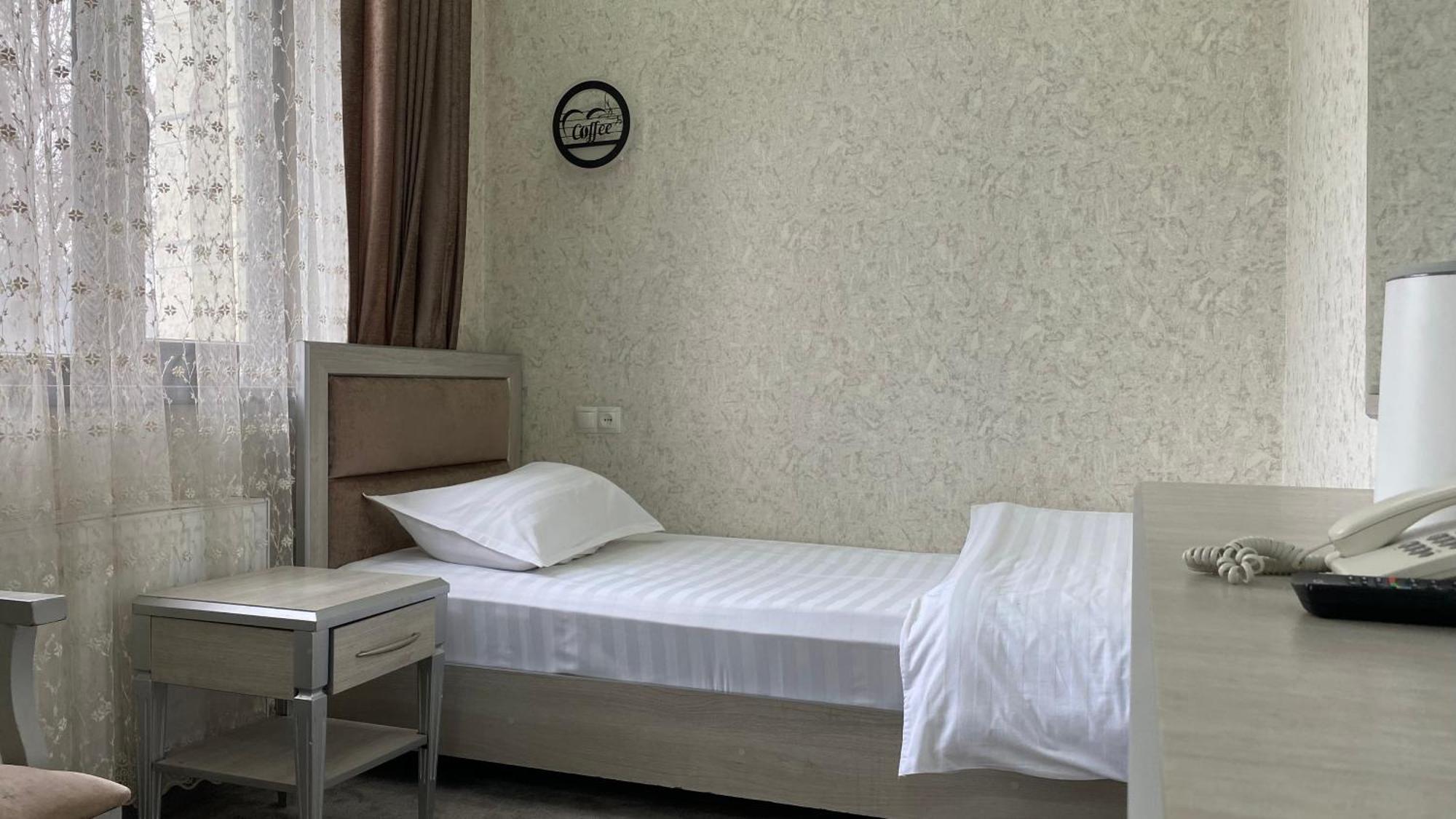 Diyor Hotel Marghilon Esterno foto