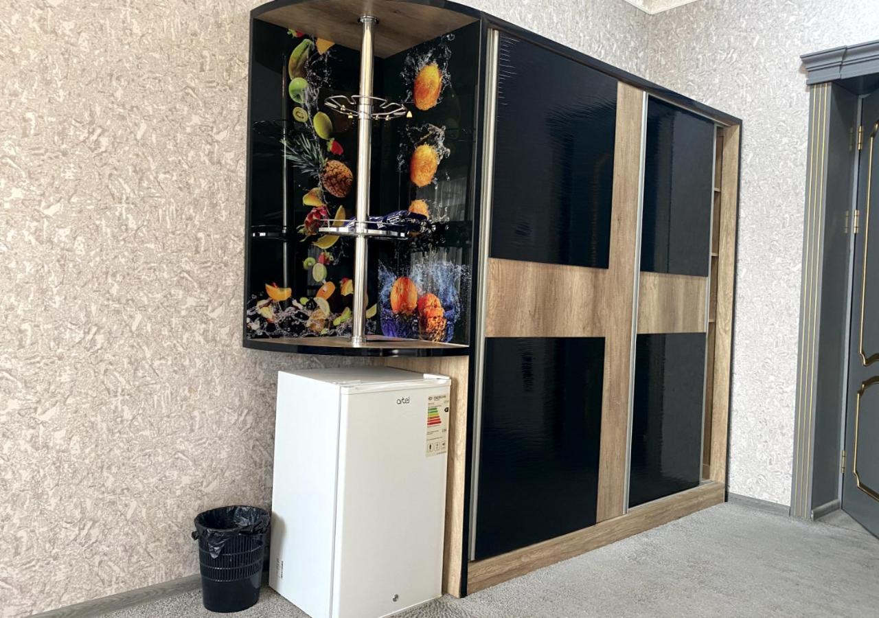 Diyor Hotel Marghilon Esterno foto