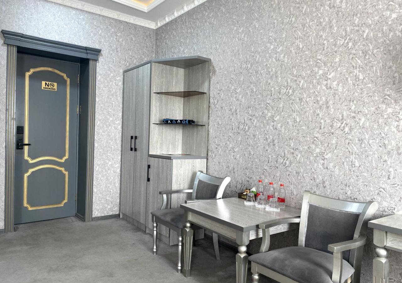 Diyor Hotel Marghilon Esterno foto