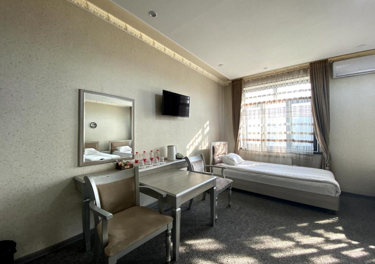 Diyor Hotel Marghilon Esterno foto