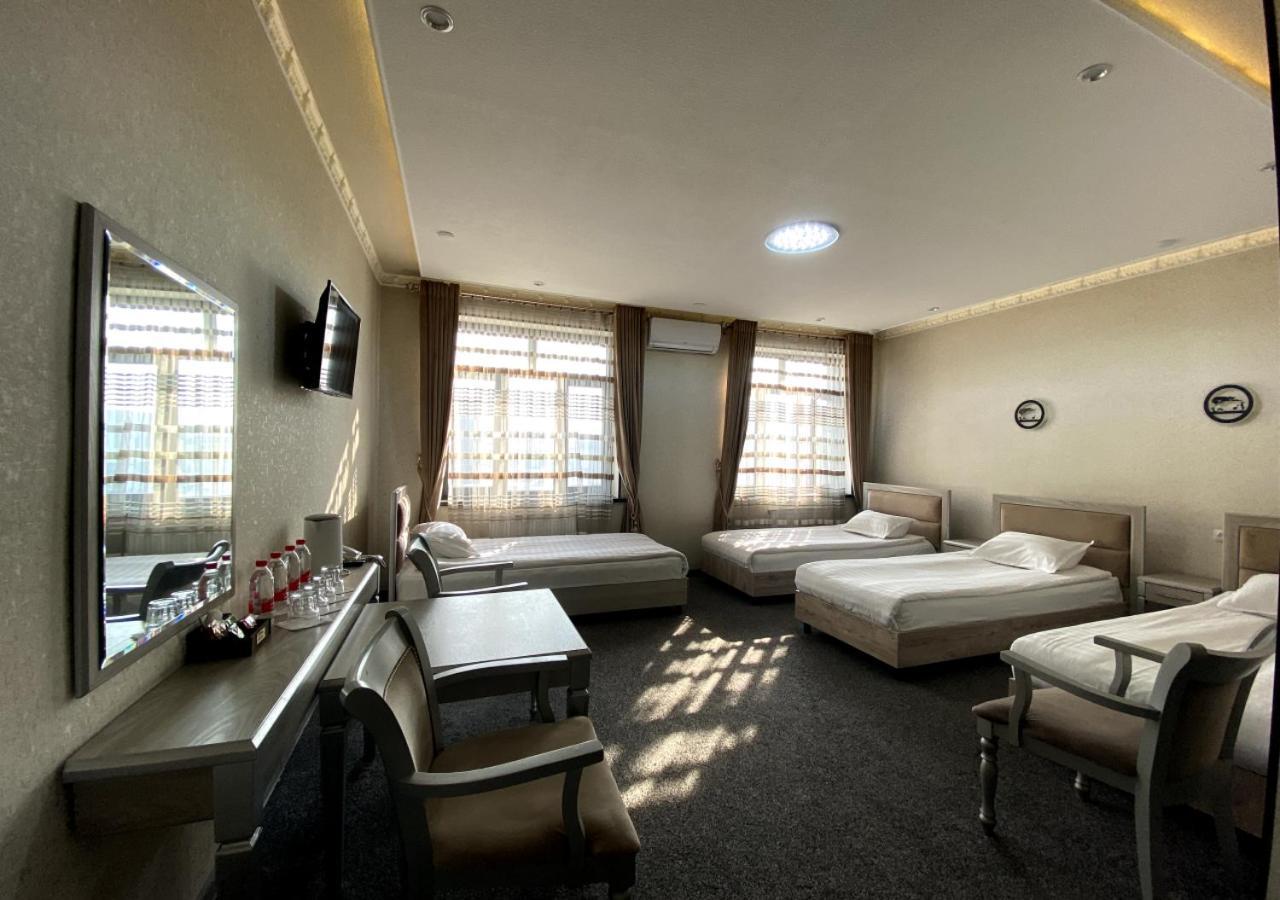 Diyor Hotel Marghilon Esterno foto