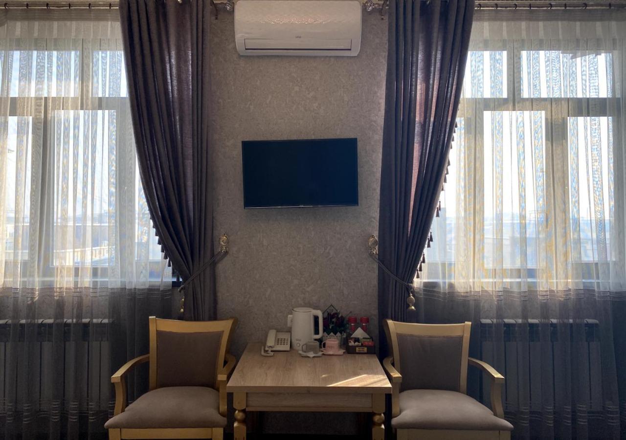 Diyor Hotel Marghilon Esterno foto
