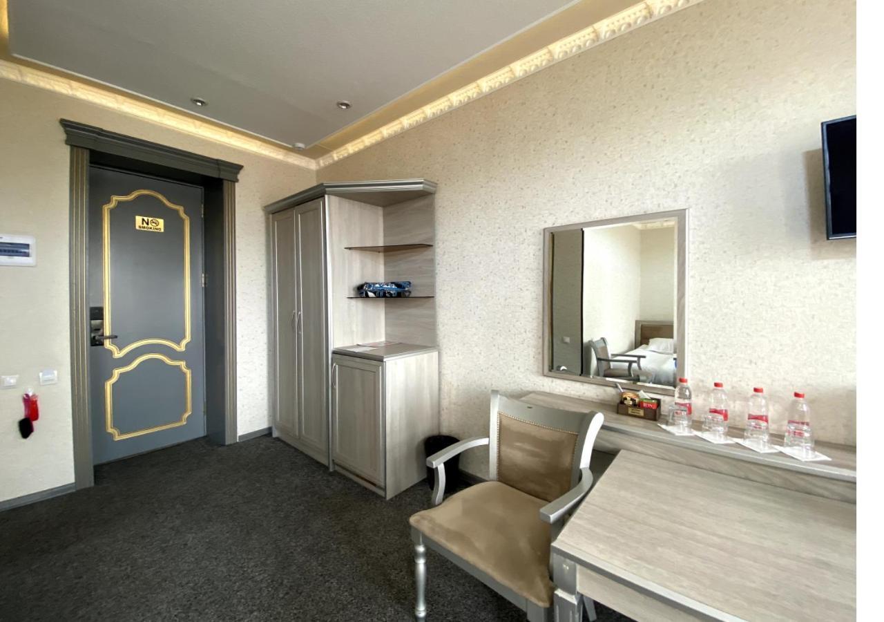 Diyor Hotel Marghilon Esterno foto