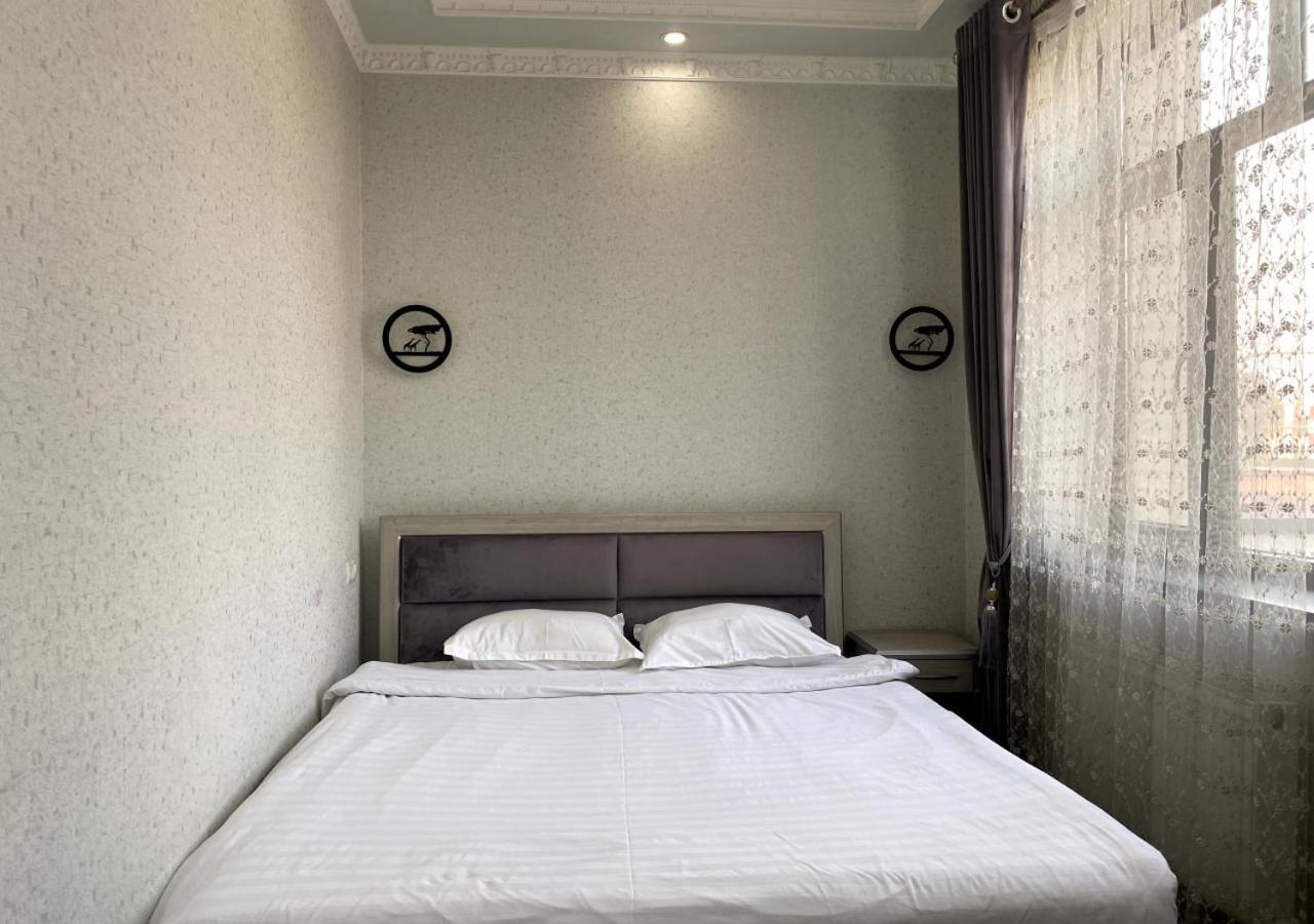 Diyor Hotel Marghilon Esterno foto