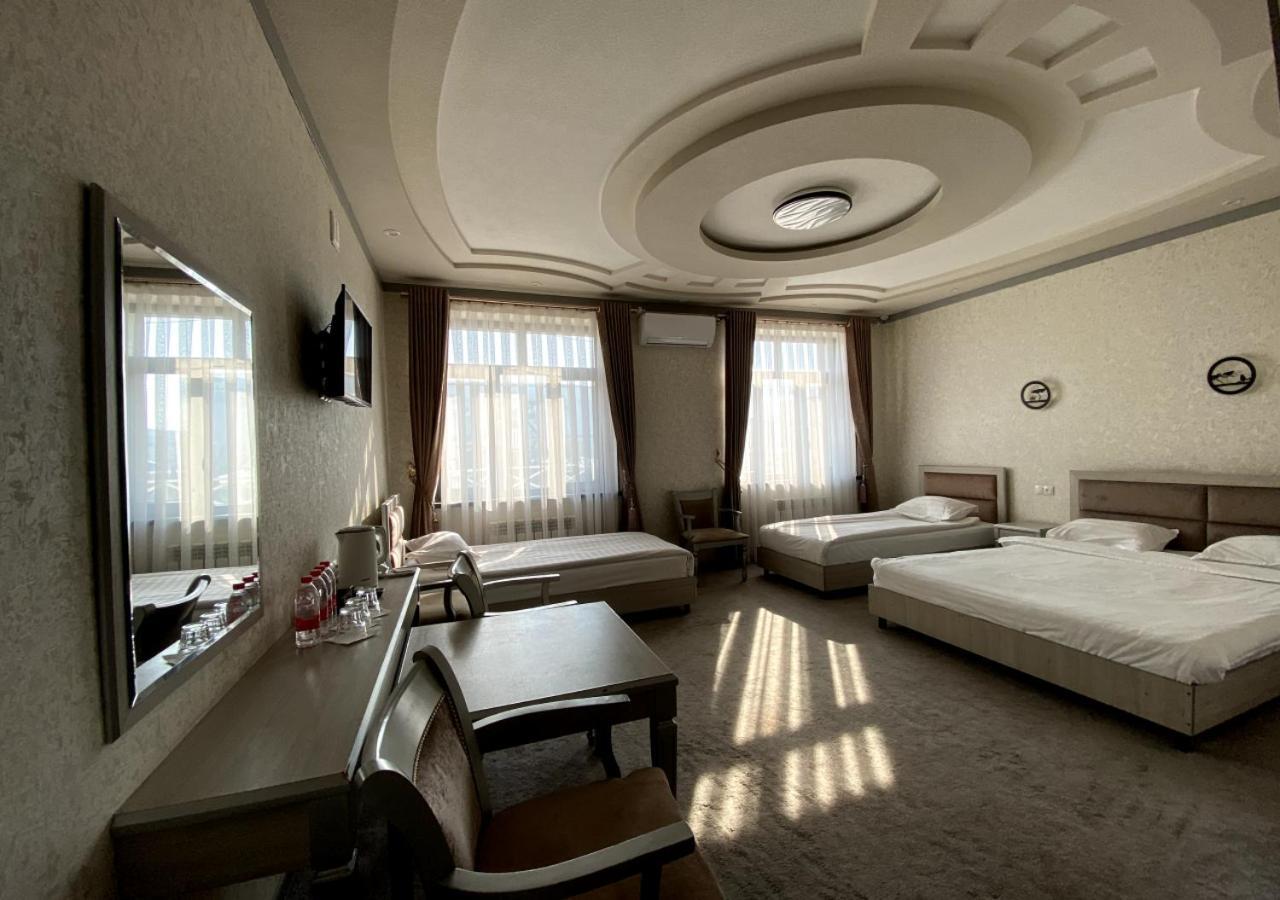Diyor Hotel Marghilon Esterno foto