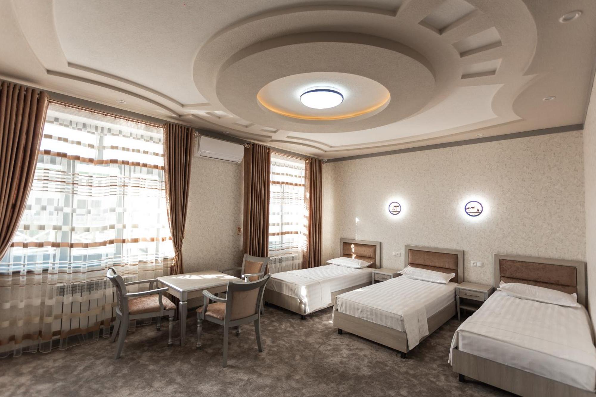 Diyor Hotel Marghilon Esterno foto