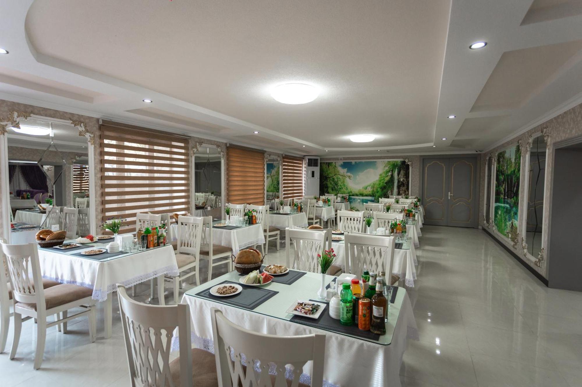 Diyor Hotel Marghilon Esterno foto