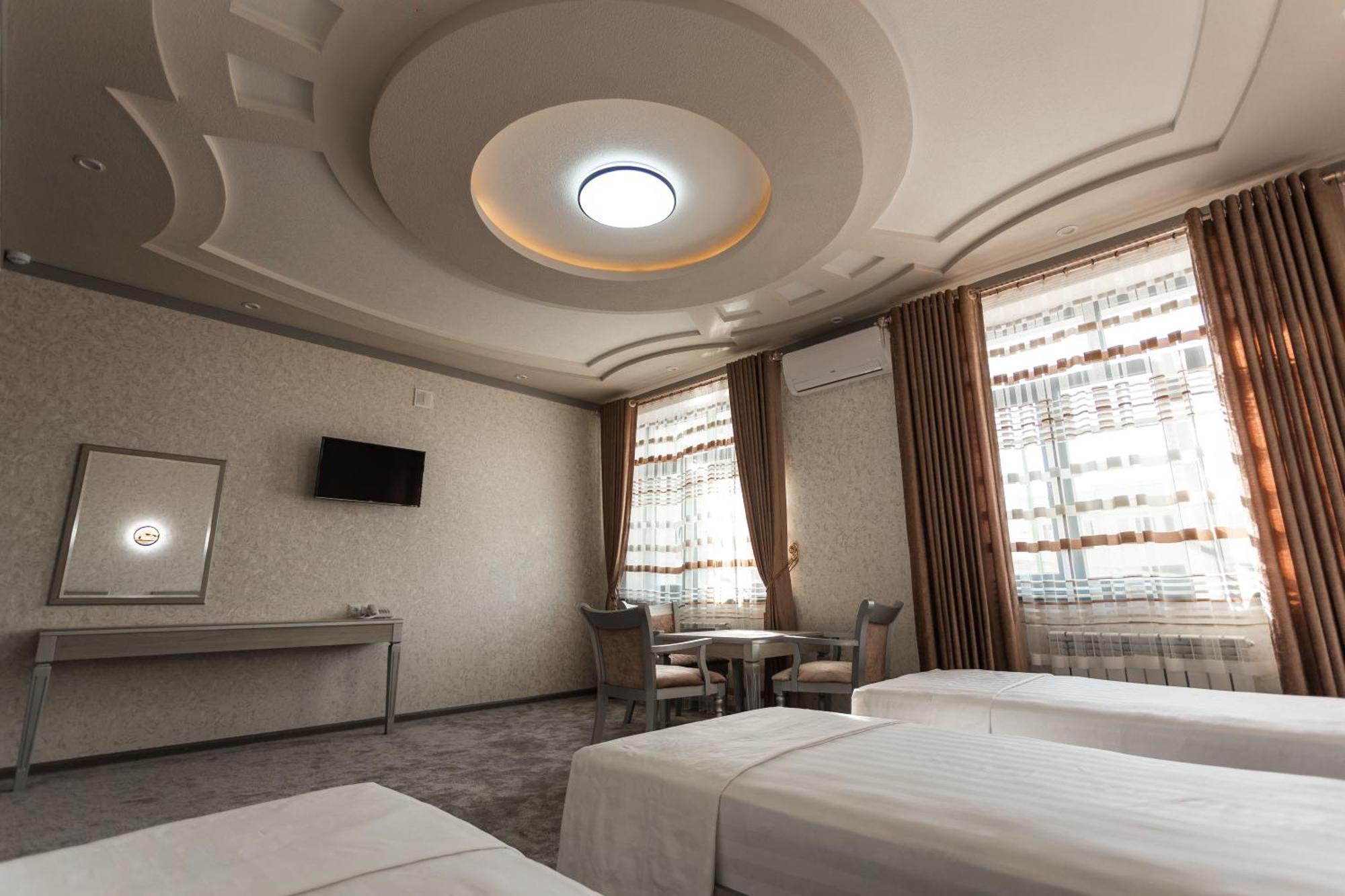 Diyor Hotel Marghilon Esterno foto
