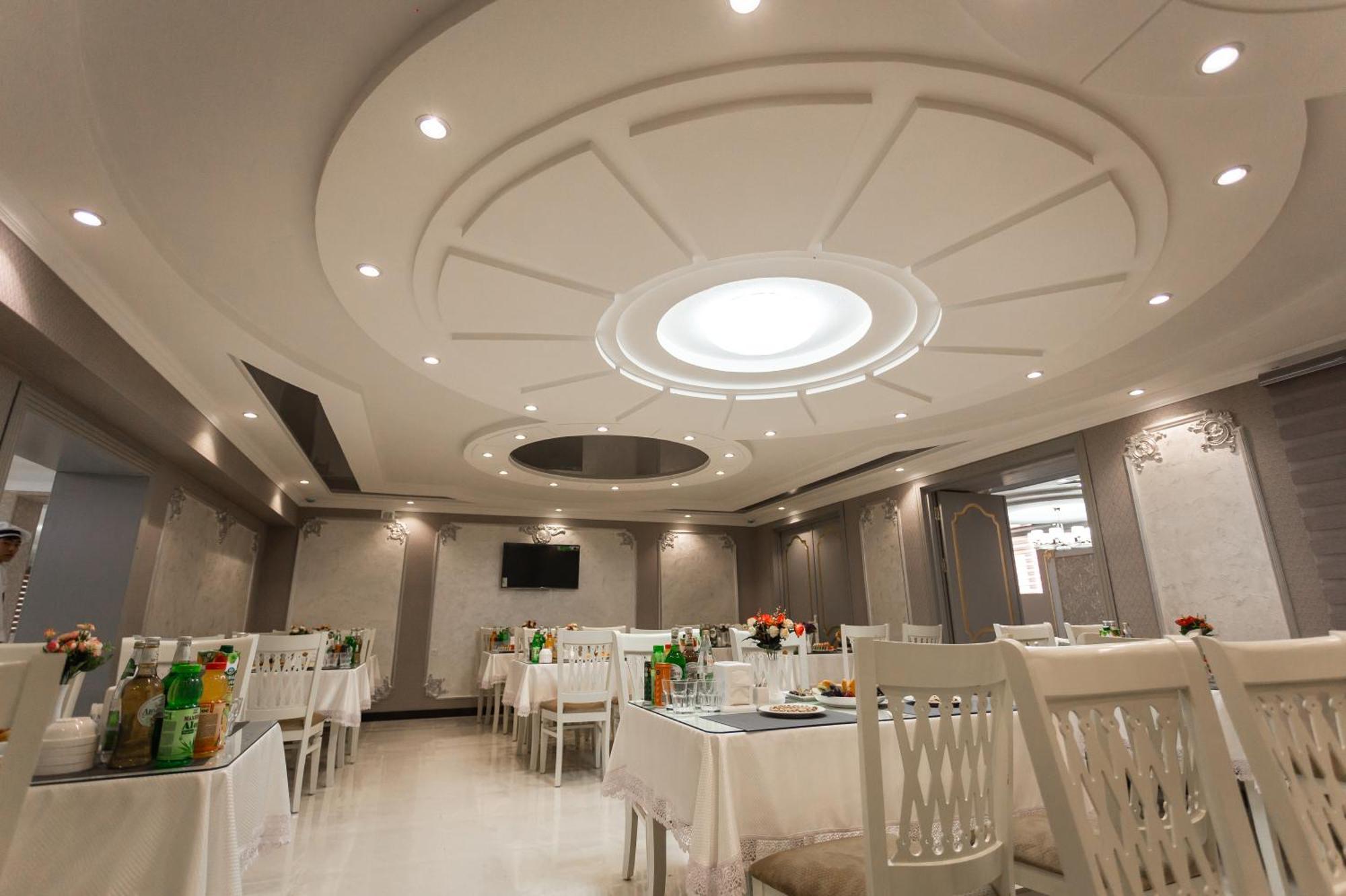 Diyor Hotel Marghilon Esterno foto