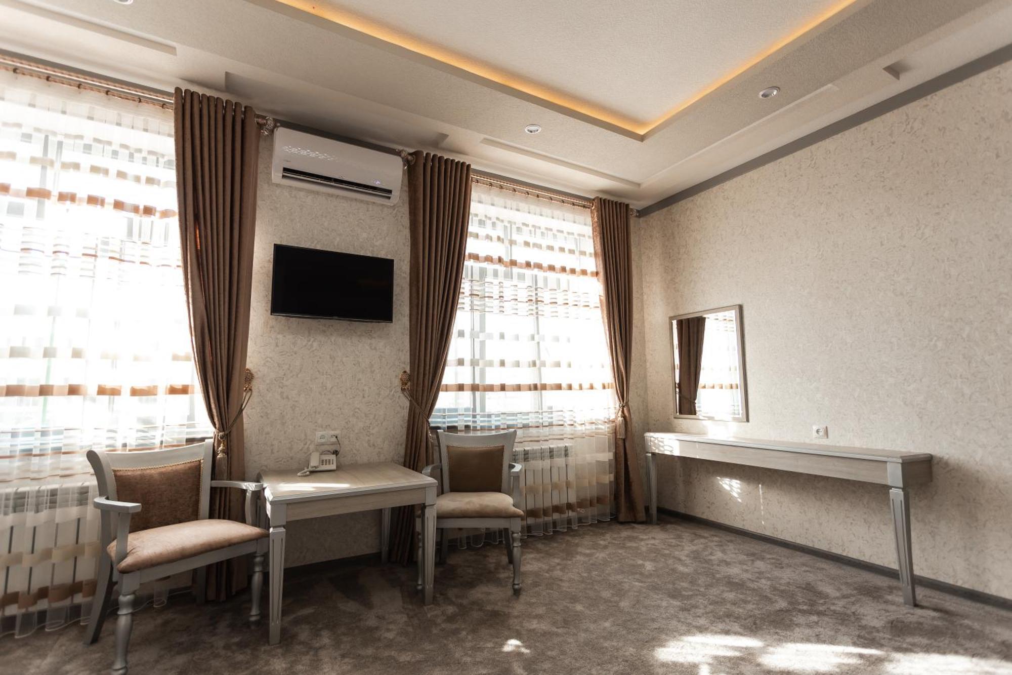 Diyor Hotel Marghilon Esterno foto